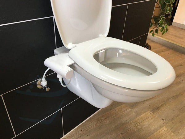wc-met-sproeier